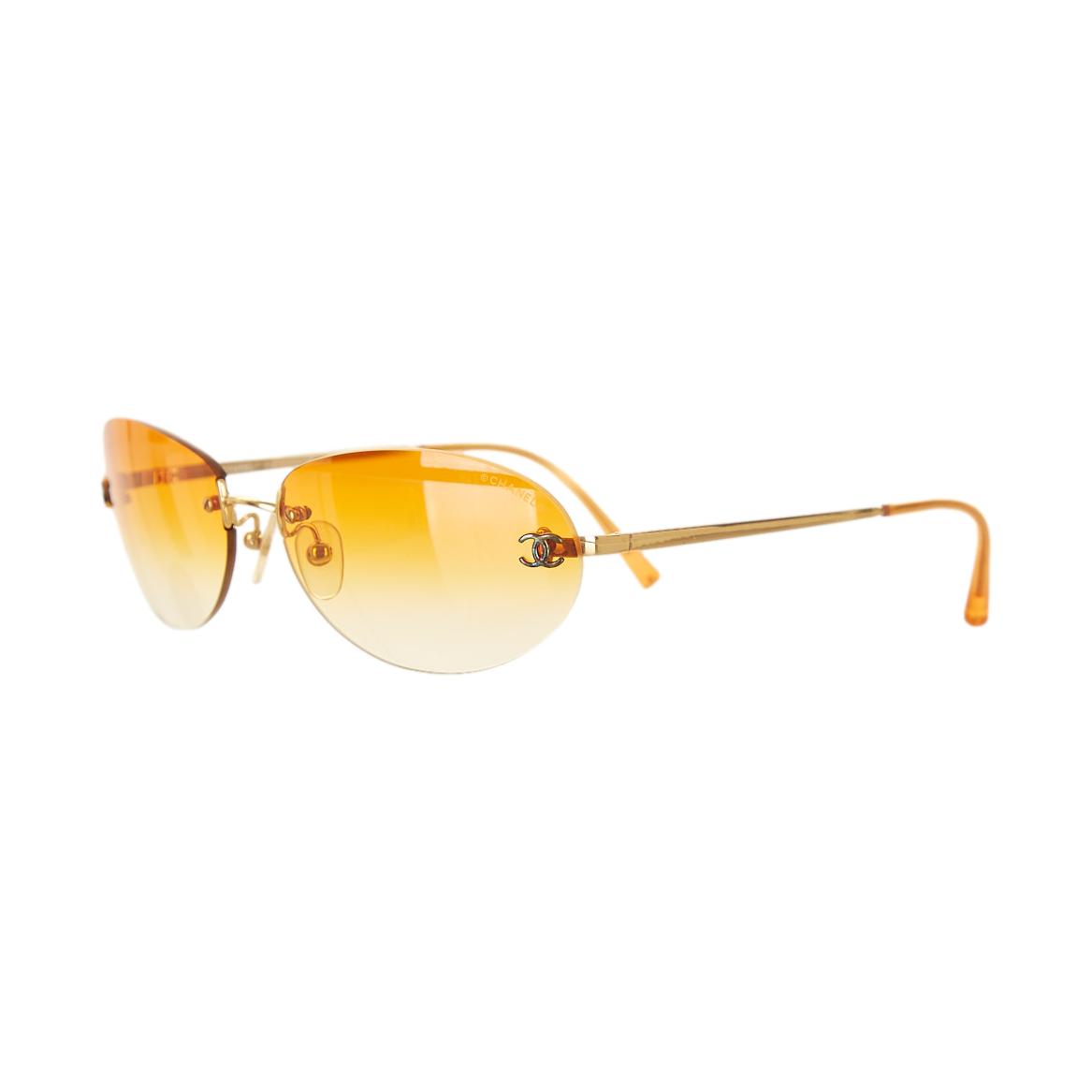 Chanel Orange Rimless Logo Oval Sunglasses – Treasures of NYC
