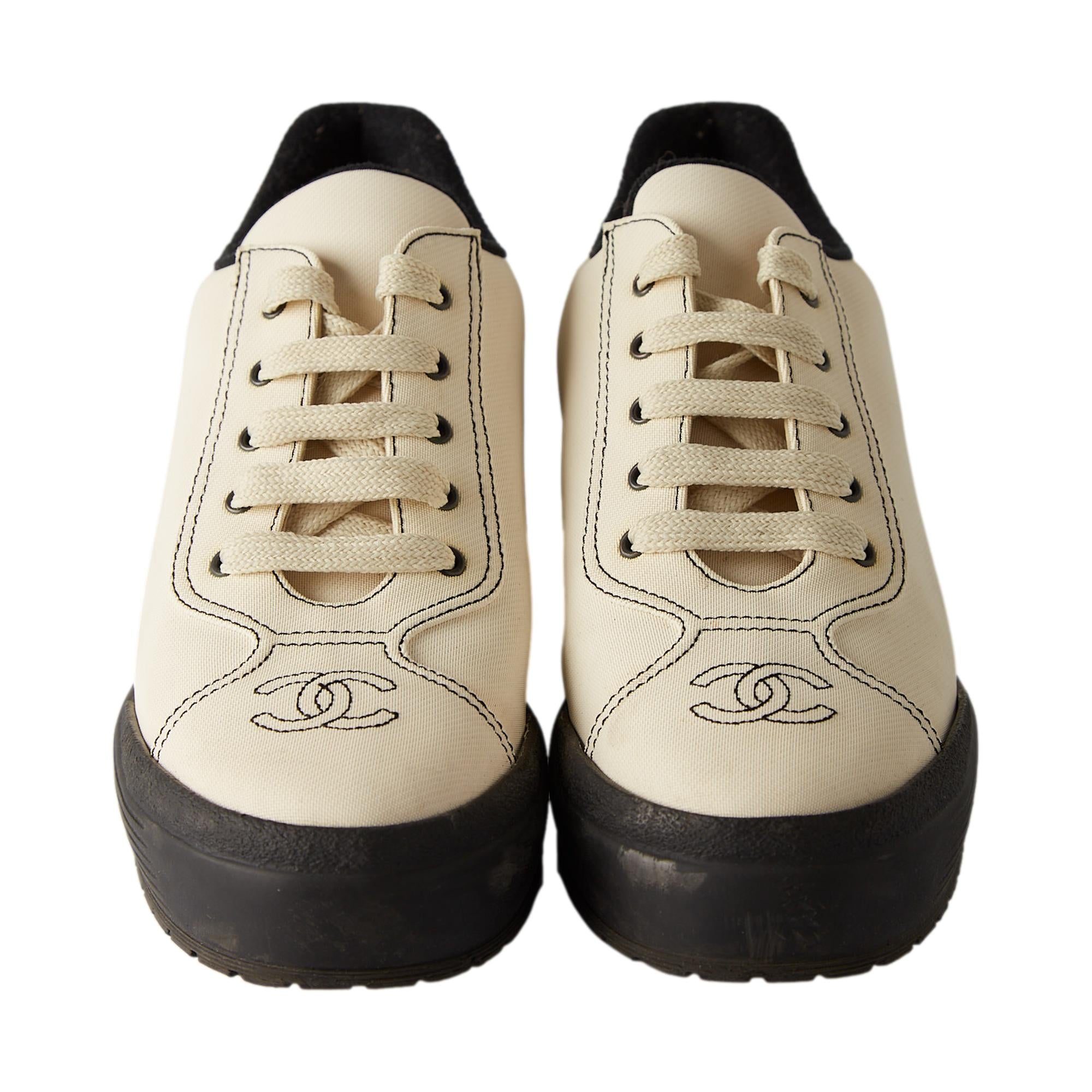 Chanel Ivory + Black Logo Sneakers