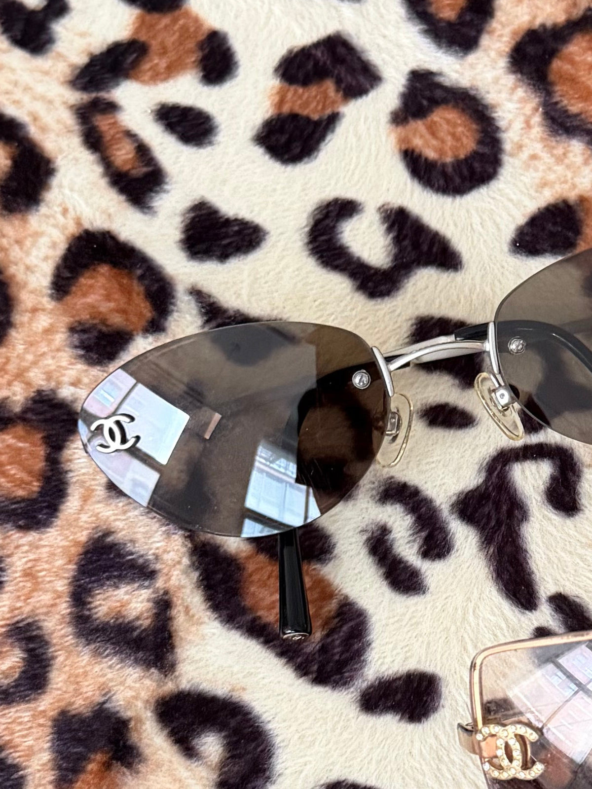 Chanel Purple Mini Rimless Sunglasses