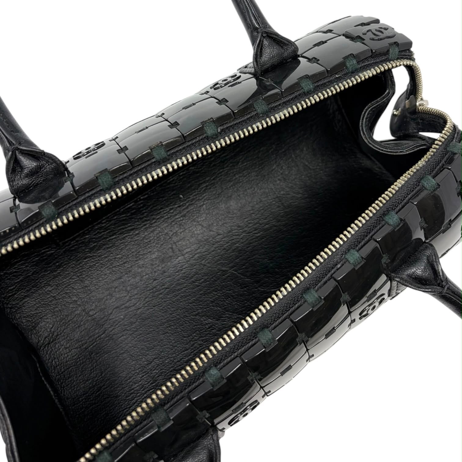 Chanel Black Logo Cylinder Puzzle Bag
