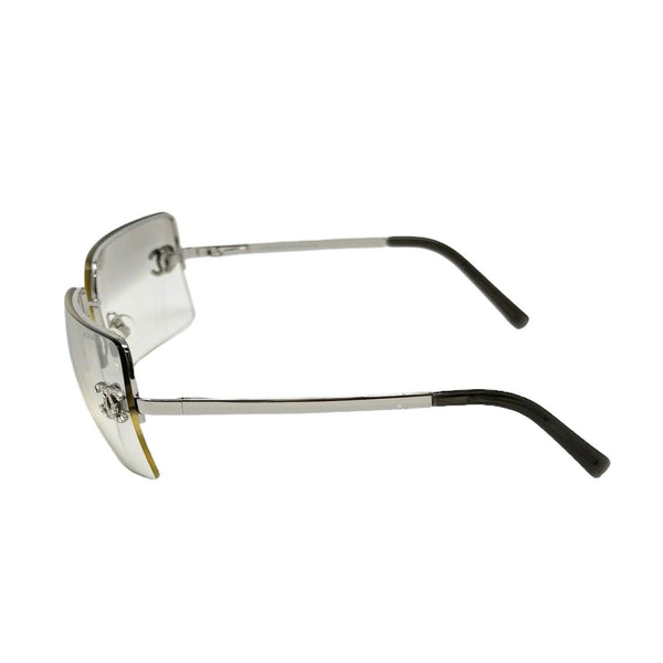 Chanel Clear Rhinestone Logo Rimless Sunglasses