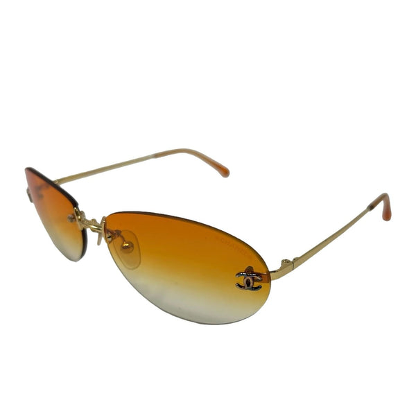 Chanel Orange Logo Rimless Micro Sunglasses – Treasures of NYC