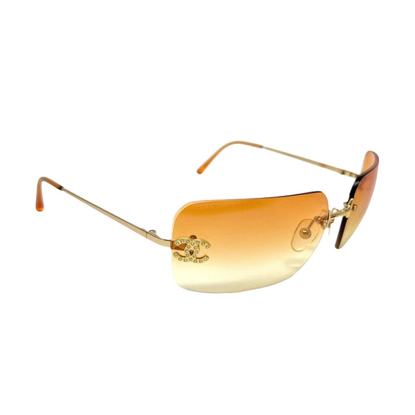 Chanel Orange Rhinestone Logo Rimless Sunglasses