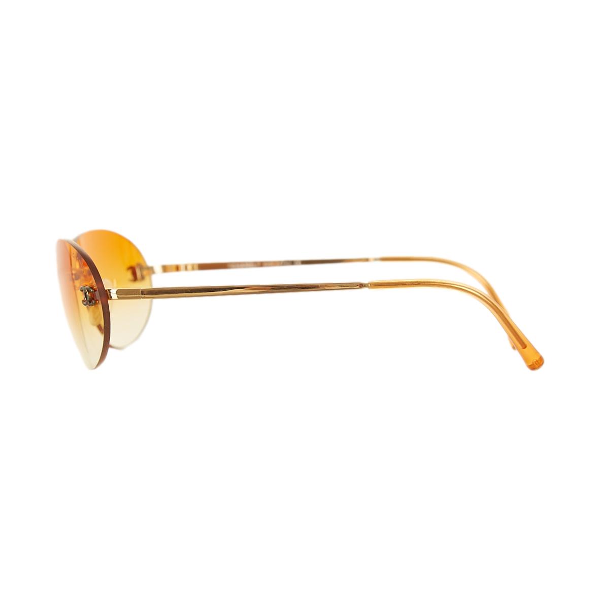 Chanel Orange Rimless Logo Oval Sunglasses
