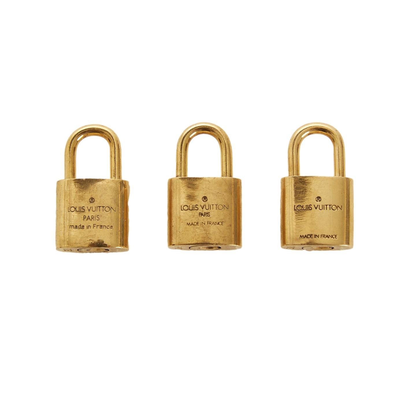 Louis Vuitton Ultra Rare Gold Combination Lock CC 33ccl1125 White gold  ref.294599 - Joli Closet