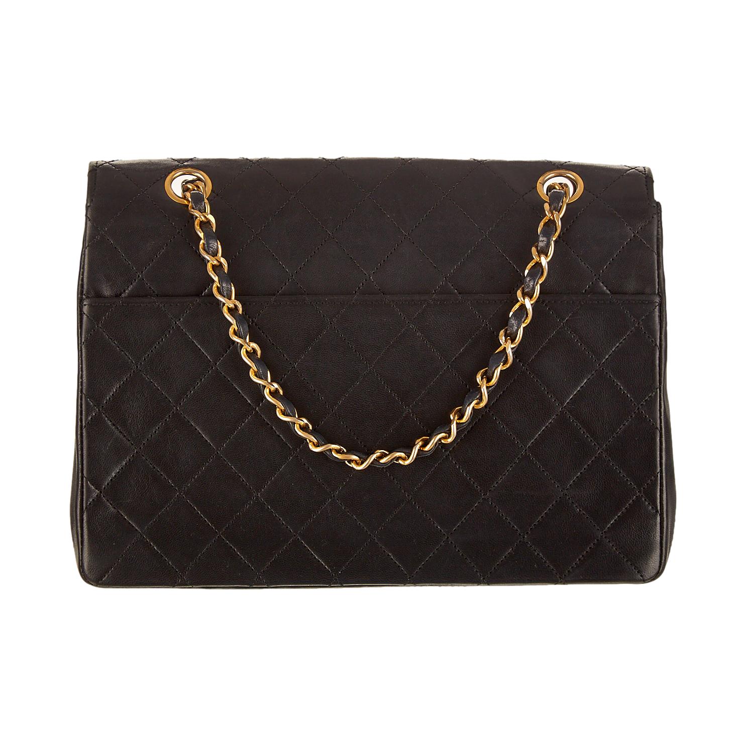 Chanel Black Quilted Logo Flap Bag – Treasures of NYC