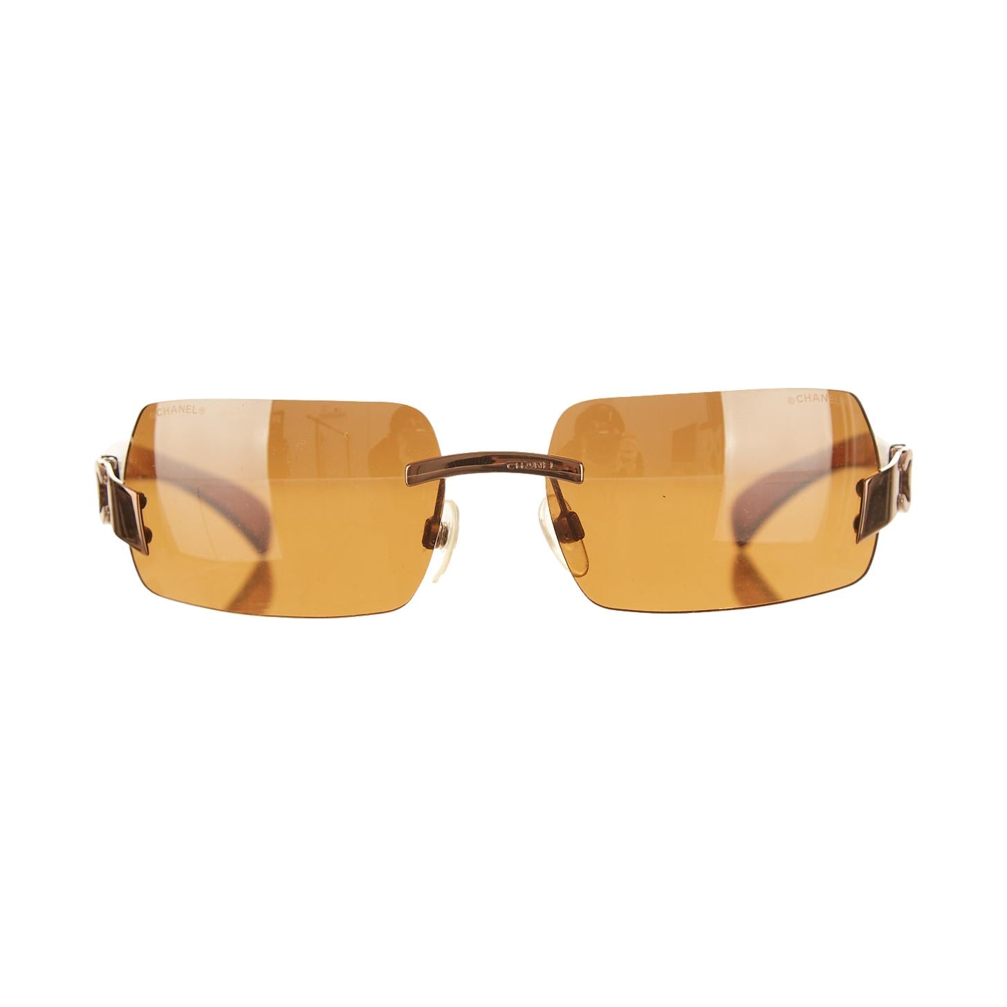Chanel Brown Logo Rimless Sunglasses