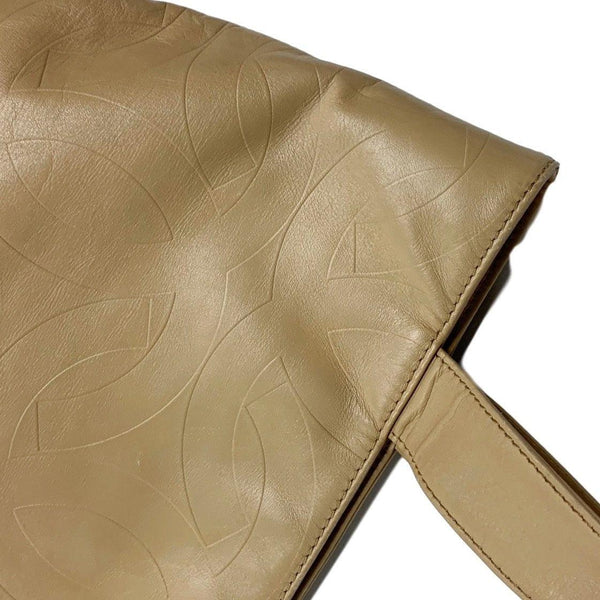 Chanel Beige All Over Embossed Logo Tote - Handbags
