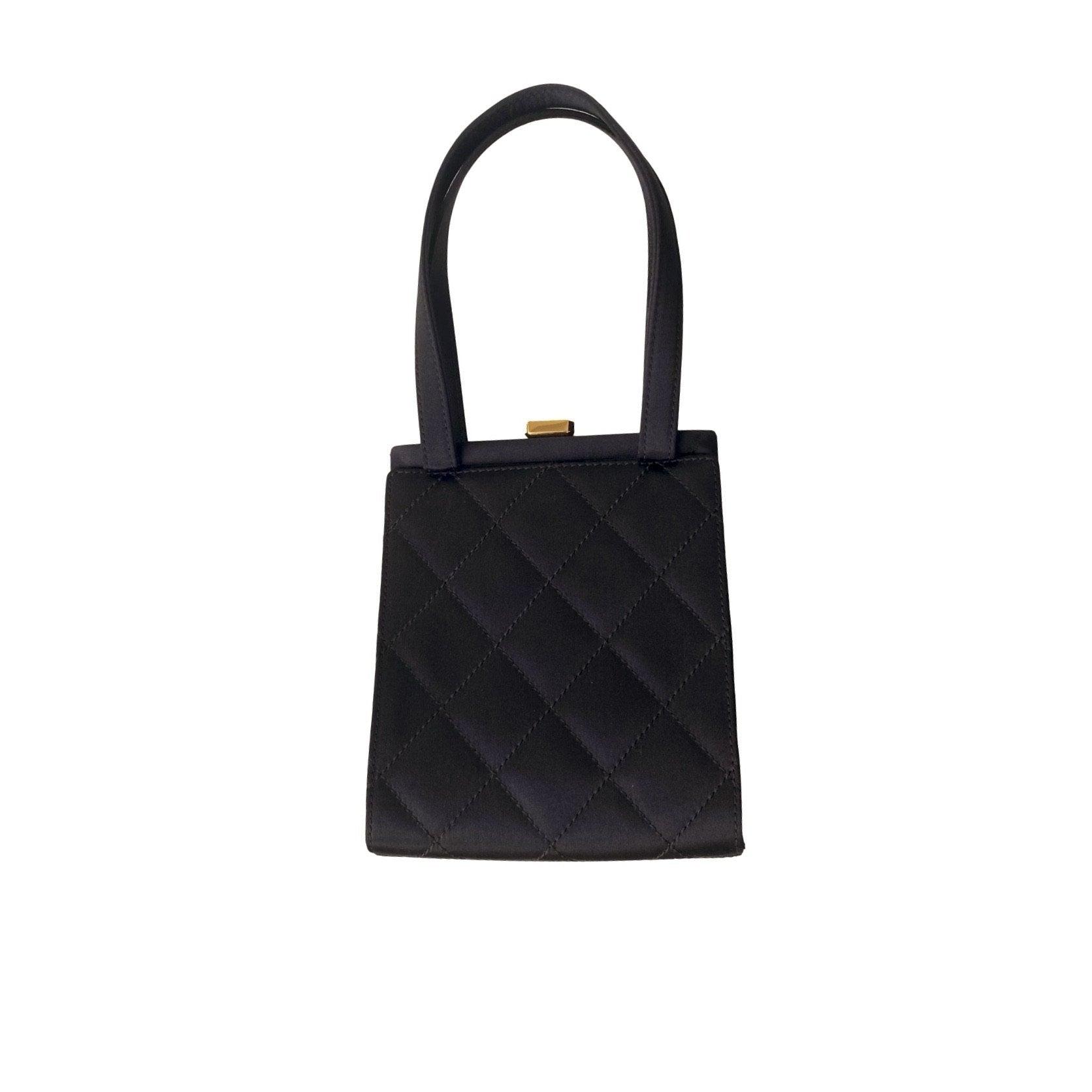 Chanel Black Quilted Mini Top Lock Bag - Handbags