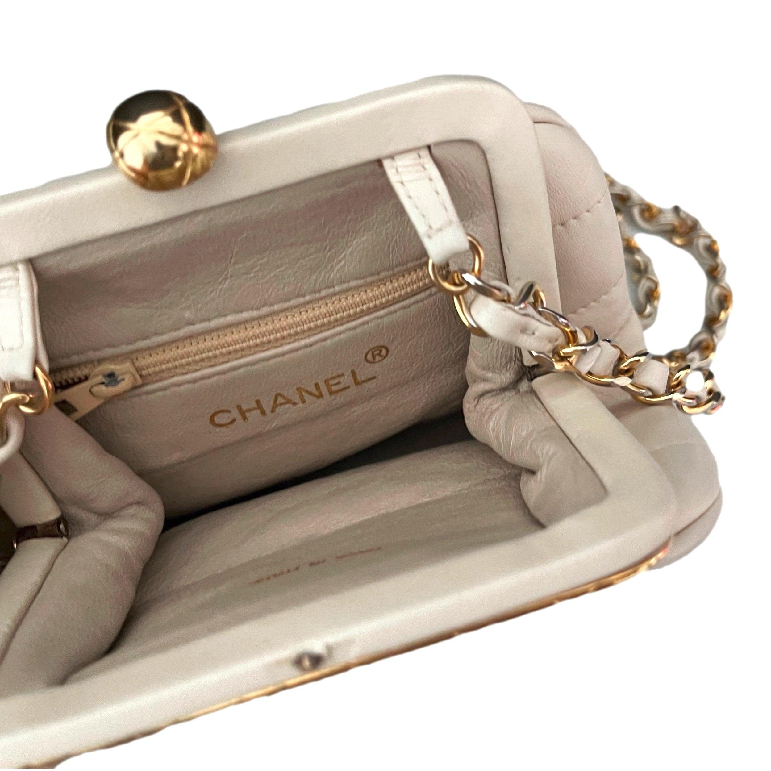 Vintage Chanel Cream Logo Kisslock Chain Bag – Treasures of NYC