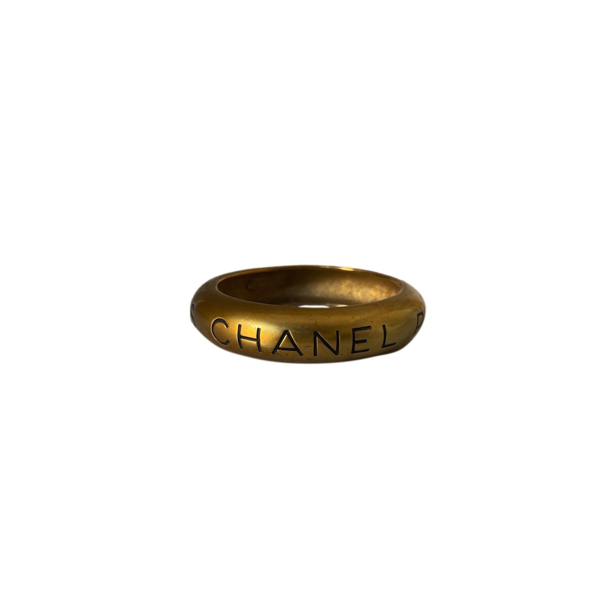 Chanel Gold Logo Bangle - Jewelry