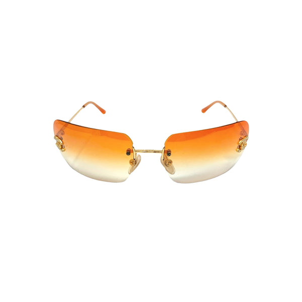 Chanel Orange Rhinestone Logo Rimless Sunglasses