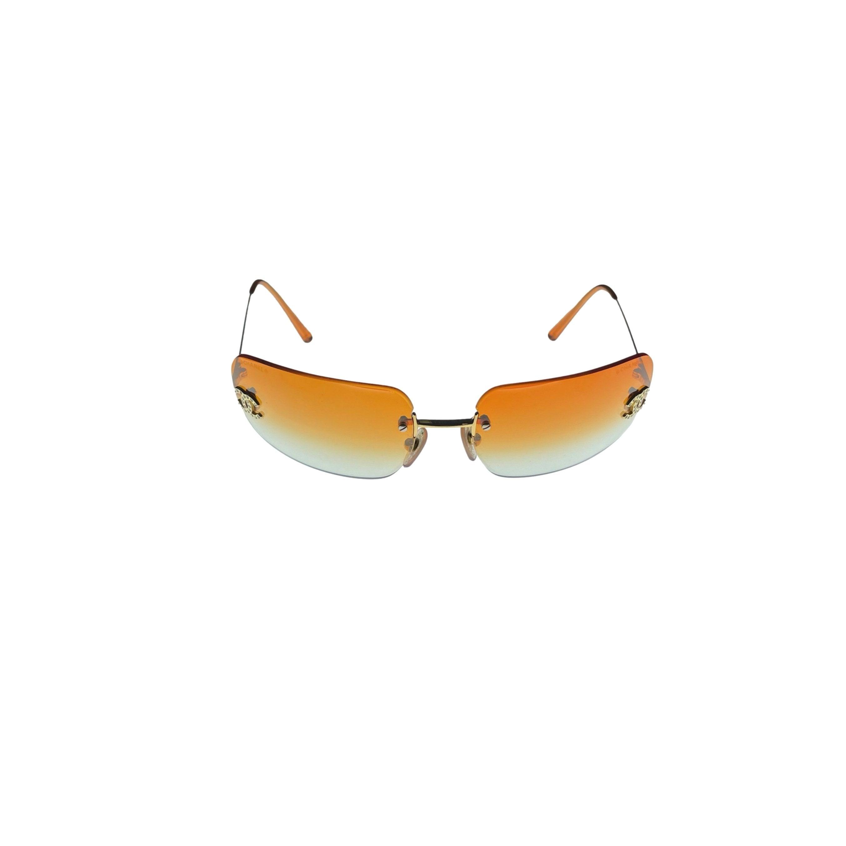 Treasures of NYC - Chanel Orange Rimless Sunglasses