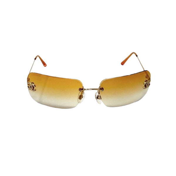 Chanel Orange Rhinestone Logo Rimless Sunglasses